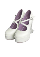 A pair of white platform Mary Jane-style heels with purple interior lining and silver buckle straps, shown on a plain white background.