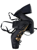 Black ballet shoes with ribbons on a white background, featuring the brand 'Dolly Bae'.
