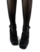 Black lace-up high heels with ribbon bows and black patterned tights, shown on a white background with the text 'Dolly Bae' below.