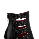 Black boot with metal accents and red details on a white background