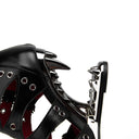 Black leather dog muzzle with metal accents on a white background
