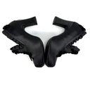 A pair of black leather ankle boots with dramatic ruffled trim and chunky soles, displayed on a clean white background with the gothic-style 'Dolly Bae' brand name printed above them.